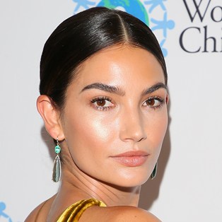 Lily Aldridge Glowing Skin Yellow Dress